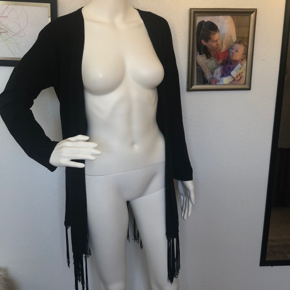 M. Fasis open front drapery